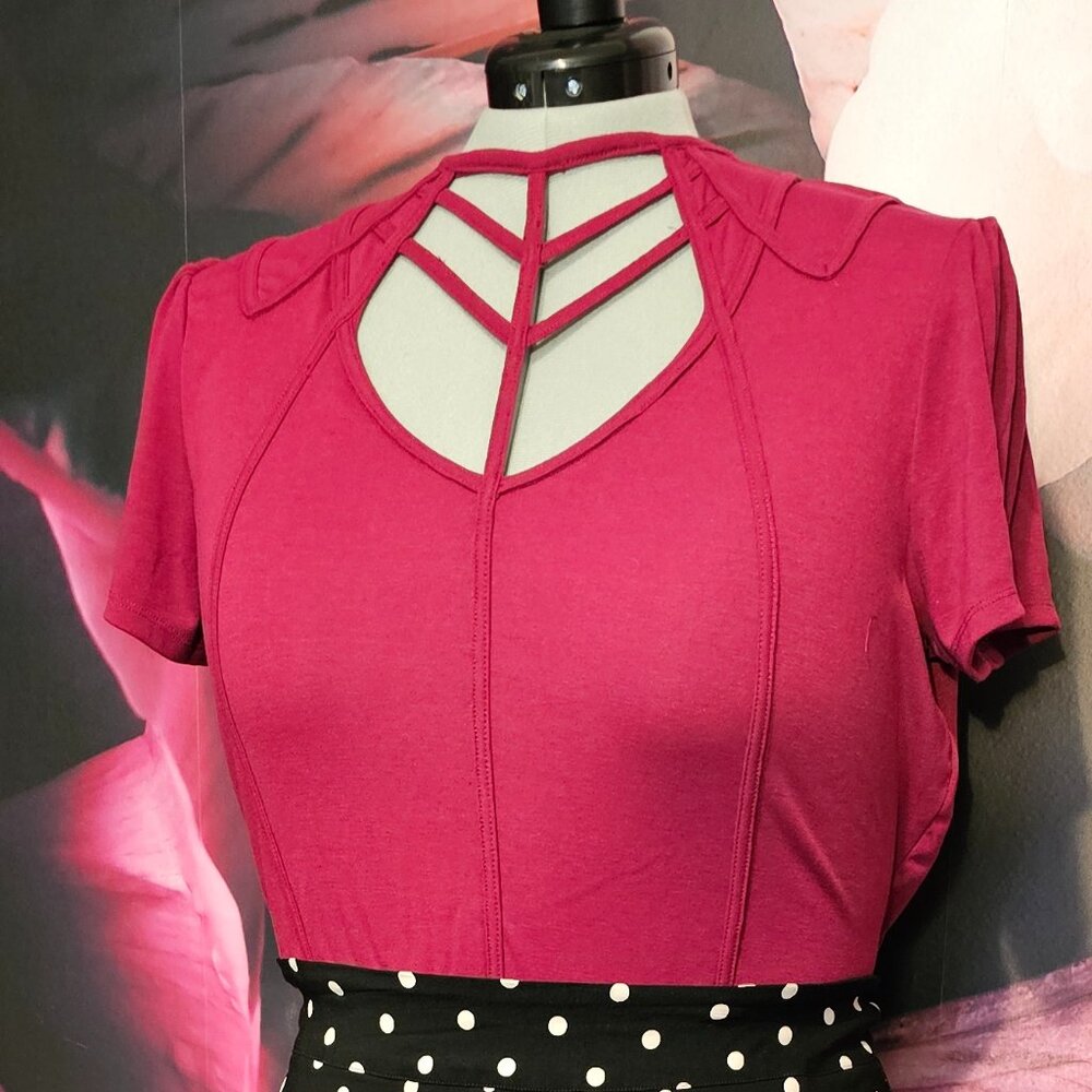 Unique Vintage cage neck top